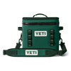 Green YETI cooler bag with straps on a white background